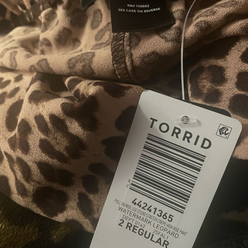 New torrid  animal print pull on pants with tie waist also has pockets sz 2x - Picture 10 of 10